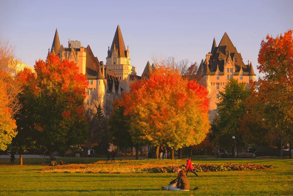 The Château Laurier in Ottawa behind trees in autumn colours